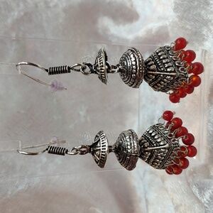 Triple Layer Jhumka Earrings In Silver Tone With Red Dangle Glass Beads